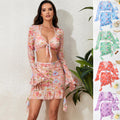 Four piece printed long sleeved hip hugging skirt
